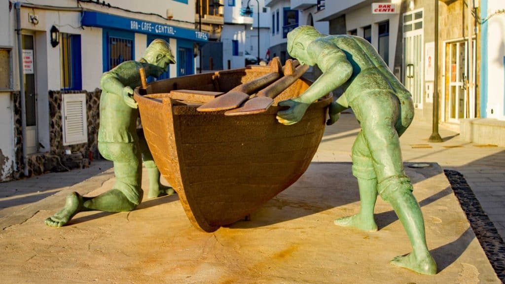 Fisherman's statue in the old harbour El Cotillo